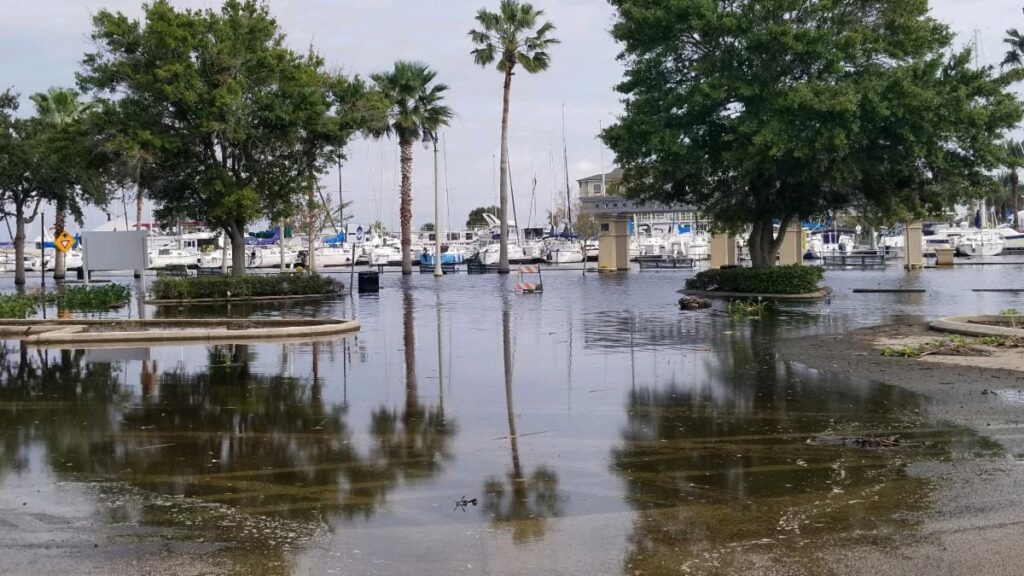 water flooding a street